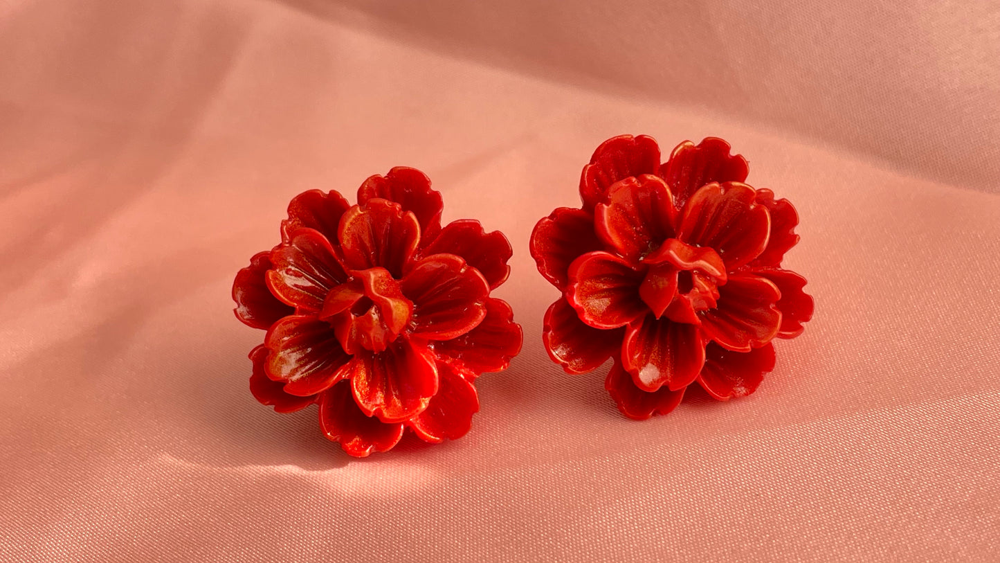 Red, blue, black, ivory flowers