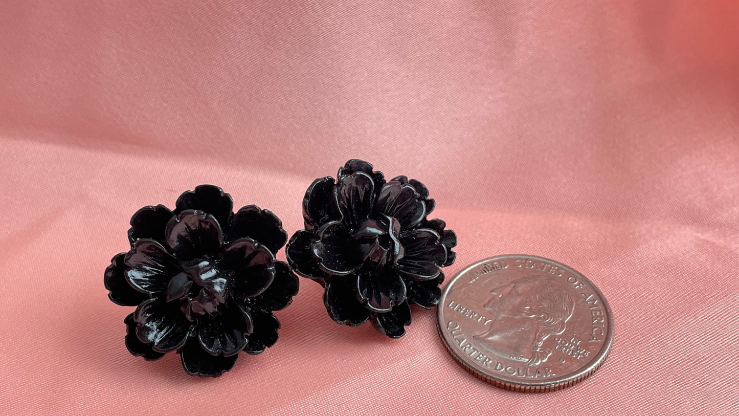 Red, blue, black, ivory flowers