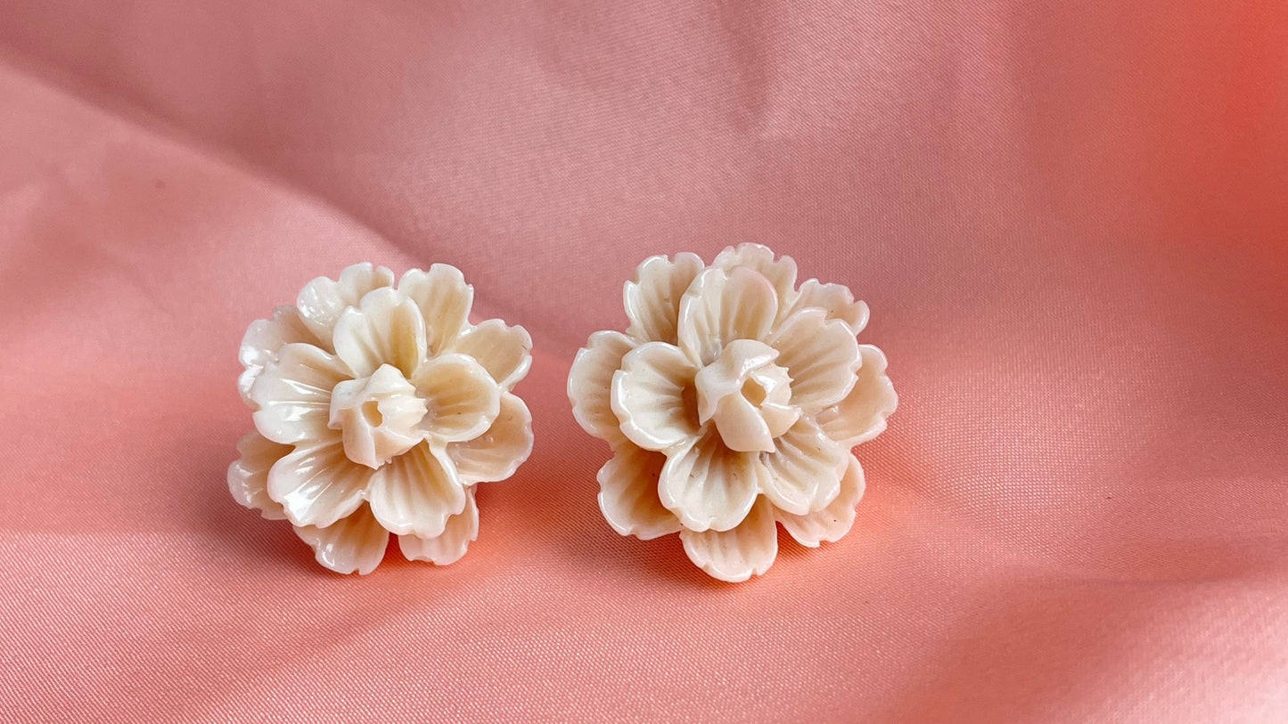 Red, blue, black, ivory flowers
