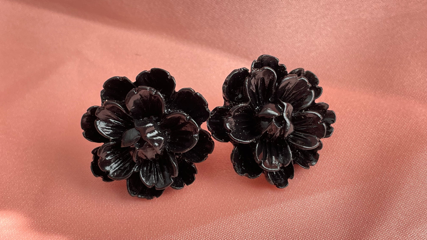 Red, blue, black, ivory flowers